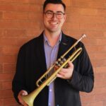 Alexander Strawn holding trumpet